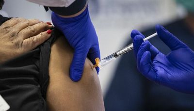 Health officials urge suburban residents to get COVID booster, flu shot ahead of holidays