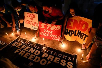 Philippine prisons chief charged in journalist's killing