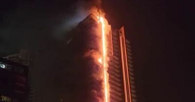 Terrifying pictures show huge fire racing up 35-storey Dubai tower near Burj Khalifa