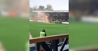 Football match descends into chaos as fans clash outside ground