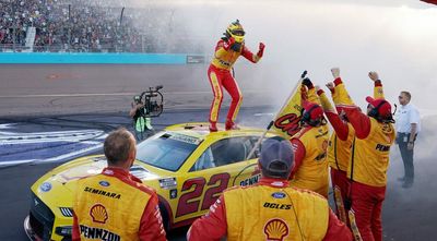 12 awesome photos of Joey Logano celebrating his NASCAR championship win