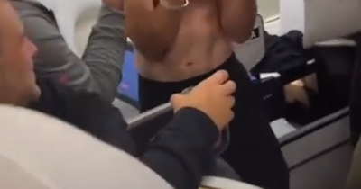 New angle of Kirk Cousins' topless celebration on private jet shows team-mates' reactions