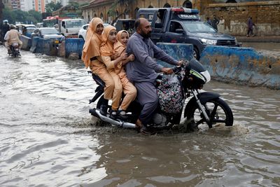 Reeling from floods, Pakistan seeks climate compensation, debt relief