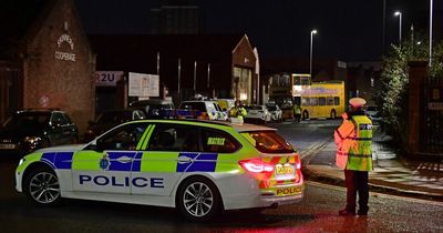 Man dies after being hit by bus as police close road