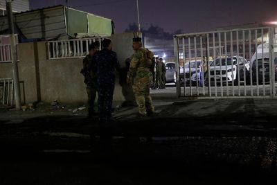 US aid worker shot dead in front of wife and child in Baghdad