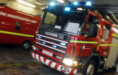 Sixteen fire crews tackle high street shop blaze overnight