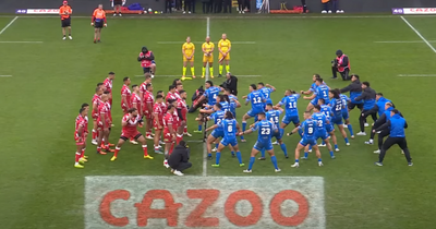 Tonga and Samoa perform pre-match war dances just inches apart before hugging