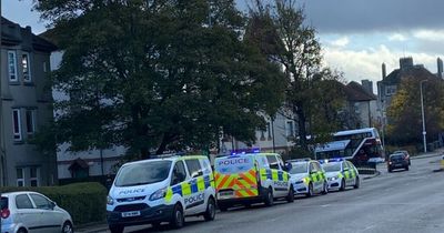 Edinburgh police race to emergency incident outside block of flats