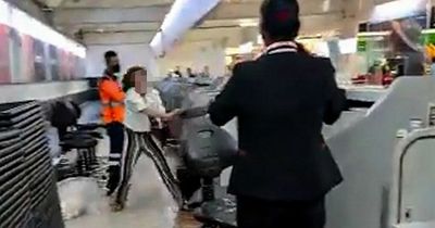 Woman filmed attacking airport check-in staff after arriving late for flight