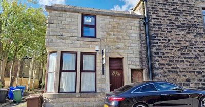 The TINY one-up one-down house in Greater Manchester that estate agents say would 'make an ideal Airbnb rental'