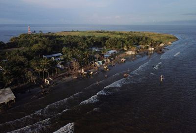 Mexican village blames climate change as sea swallows its homes