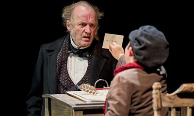A Christmas Carol review – Adrian Edmondson stars in a biting tale for our times