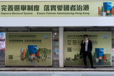 Hong Kong charges four for reposting election boycott calls