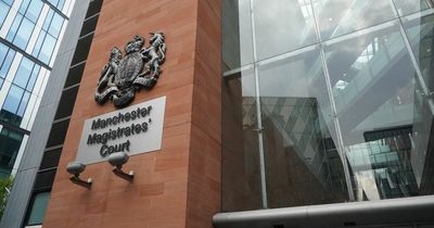 Man charged after guns found buried in Manchester park