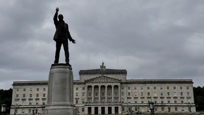 UK delays Northern Ireland election in hope of progress in EU talks