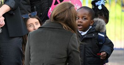 Kate Middleton gives little boy her poppy in adorable moment during surprise visit