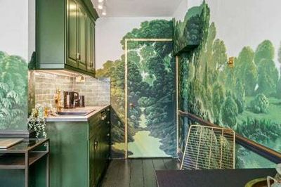 Inside the tiny London studio with a handpainted wraparound mural of Clissold Park