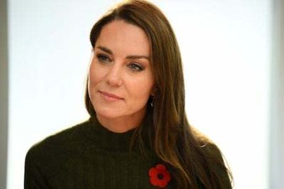 Kate gives poppy to little boy during visit to ‘amazing’ London children’s centre