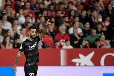 Real Sociedad beat nine-man Sevilla to go third
