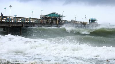 Hurricane Nicole strikes Bahamas, Florida with surge, heavy rain and high winds