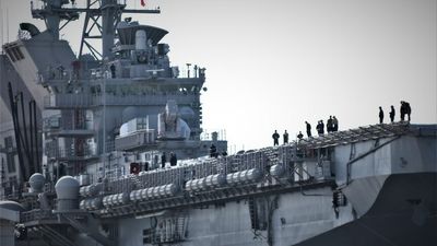 US Navy arrives in Hobart as USS Tripoli amphibious assault ship docks to give its crew a break