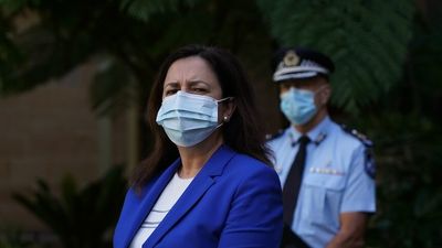 Fourth COVID-19 wave has arrived in Queensland, says Premier, masks advised from Friday