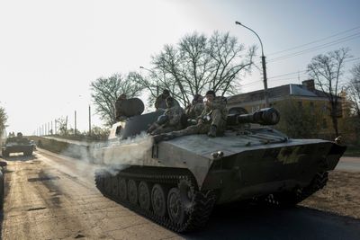 Ukraine cautious as Russia orders troops out of Kherson