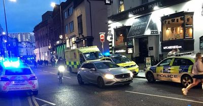 Woman arrested as emergency service worker attacked outside city centre bar