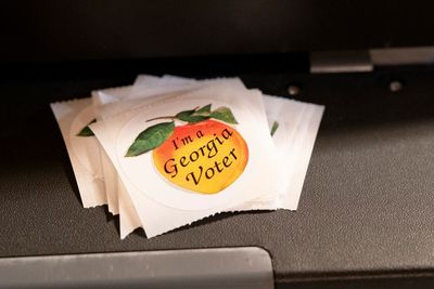 How Georgia's Senate runoff between Walker and Warnock works