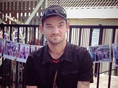 Son tried to help dad after park stabbing
