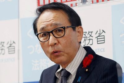 Japan minister to quit over execution remark, PM delays trip