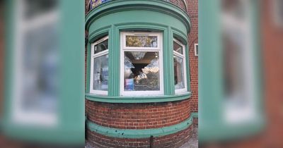 Pub windows smashed by balaclavas thugs on motorbike