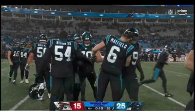 Baker Mayfield is out here headbutting Panthers teammates without a helmet on