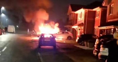 Footage shows luxury Mercedes up in flames on quiet Lanarkshire street as cops probe deliberate attack