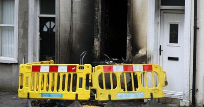 North Belfast fire: Two taken to hospital after blaze from 'mattress set alight' outside home spreads