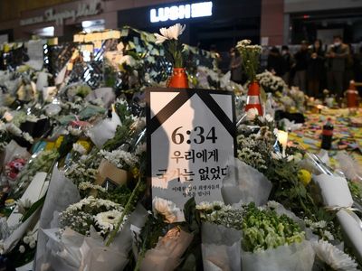 A Seoul police officer, under investigation after the crowd crush, is found dead