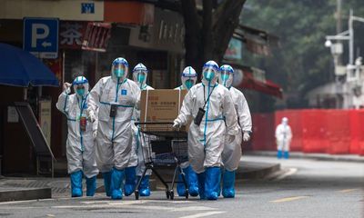 China eases Covid rules but insists ‘war’ against pandemic will continue
