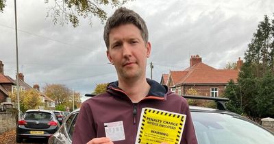 Dad hit with fine because of upside down parking ticket