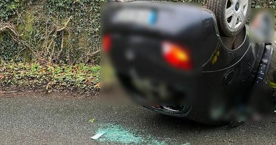 Road closed after car flipped onto its roof in Dublin crash