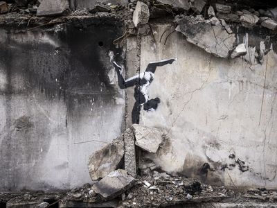 A new Banksy mural adorns a destroyed building in Ukraine