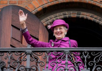 Denmark's queen delights jubilee crowds after family spat