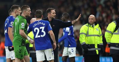 Frank Lampard pulls Everton players away from furious fans as police intervene