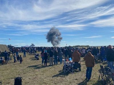 Six killed as World War II bomber and fighter plane involved in midair collision at Dallas airshow