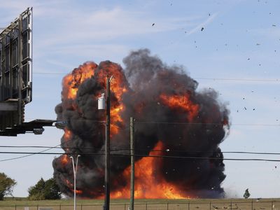 Two historic military planes collide and crash during an air show in Dallas