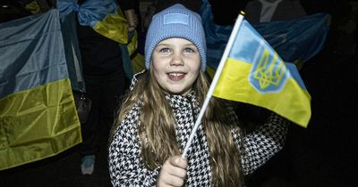 Ukrainian children join in street celebrations after Russian troops flee Kherson