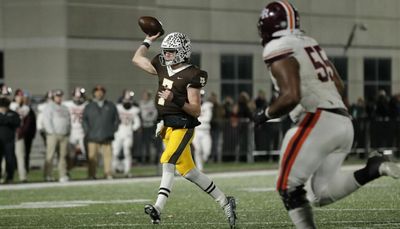 Blainey Dowling throws five touchdown passes in Mount Carmel’s rout of Brother Rice