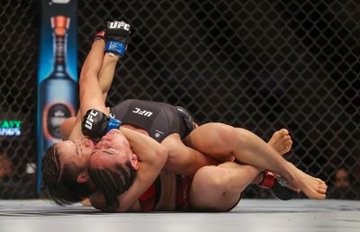 UFC 281 results: Zhang Weili wins back title with unusual rear-naked choke submission of Carla Esparza