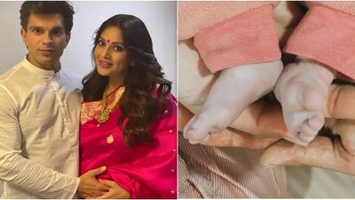 Entertainment: Bipasha Basu, Karan Singh Grover share glimpse of their new born, name her Dev