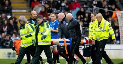 Leon King update provided by Rangers after defender stretchered off with worrying head knock