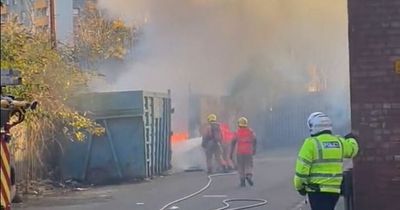 Plumes of smoke seen over Salford as crews tackle fire at scrap yard
